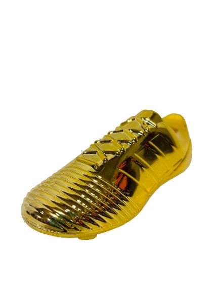 Zapato de futbol dorado
